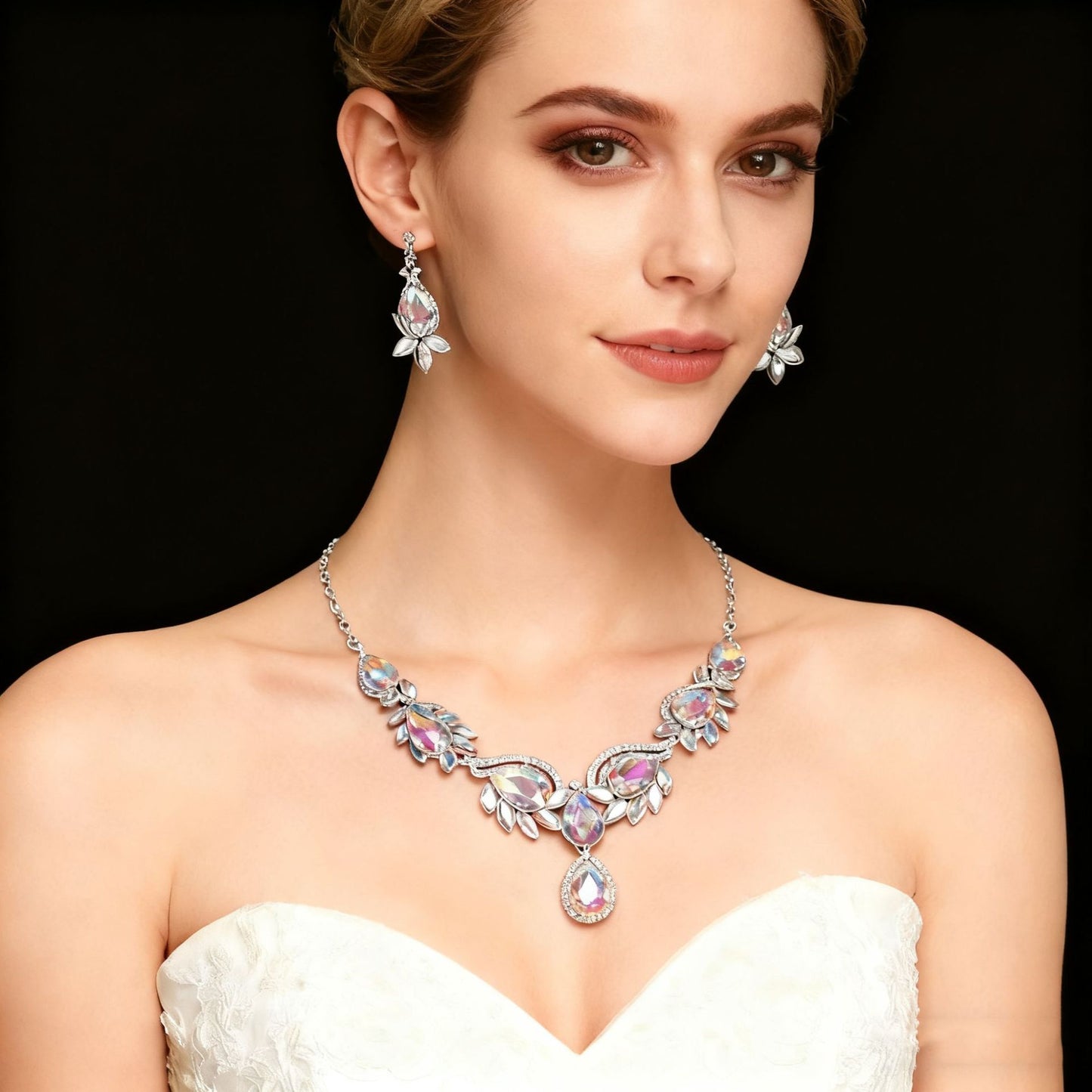 Woman wearing elegant aurora crystal necklace and earrings set