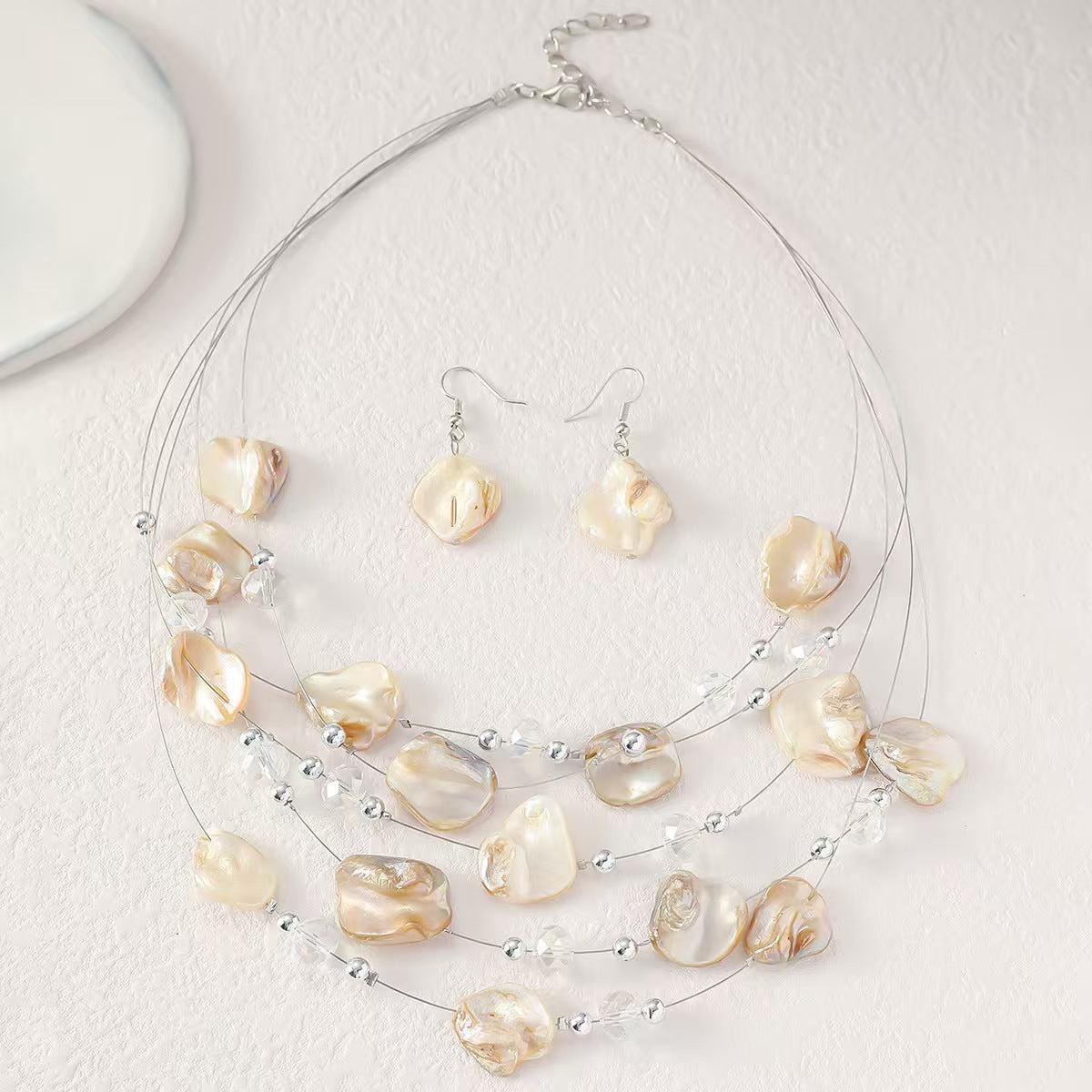 Elegant layered shell necklace set with matching earrings for women