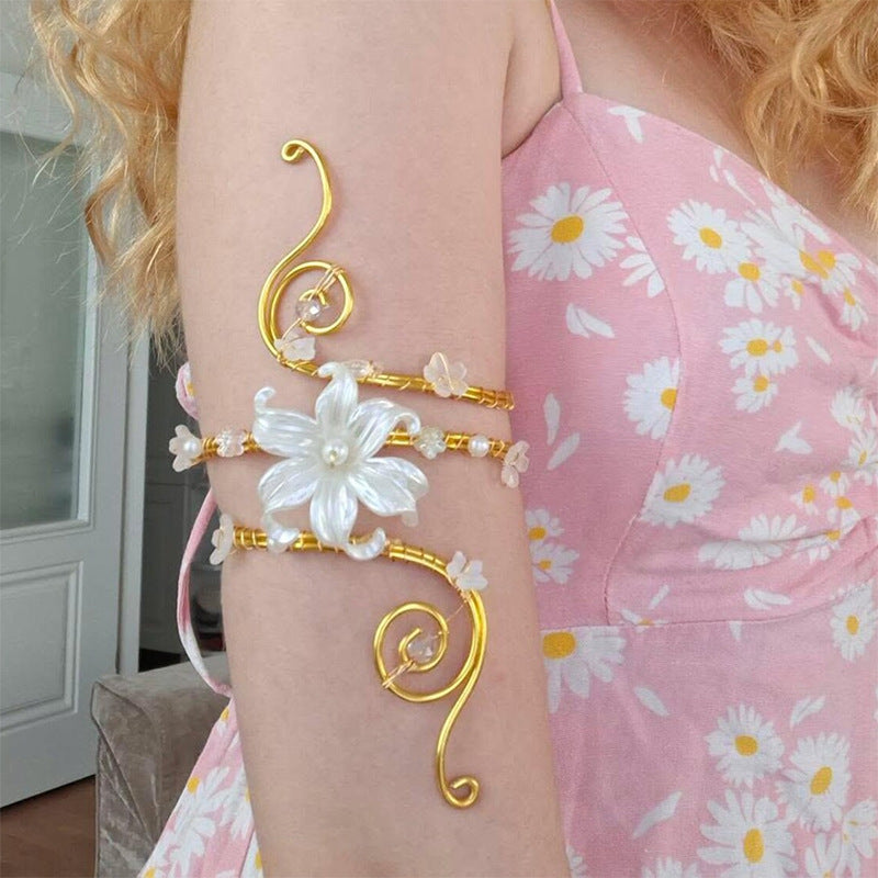 Gold fairy floral arm cuff bracelet with handcrafted translucent flower and adjustable swirl wire design