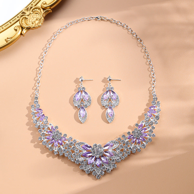 Lavender silver rhinestone necklace set with matching earrings
