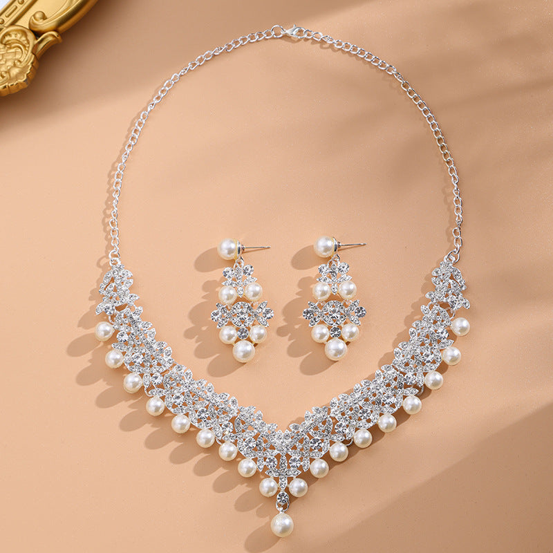 Pearl white bridal rhinestone necklace set with matching earrings